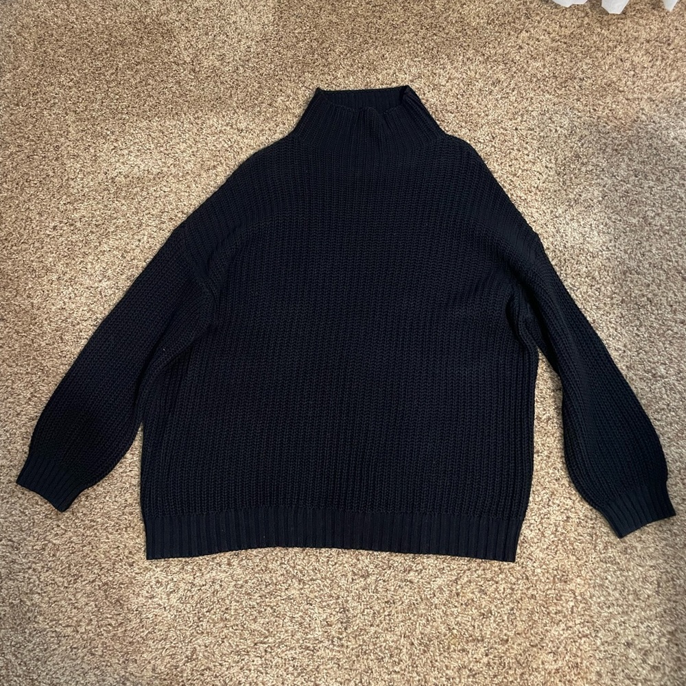Oversized black turtleneck sweater